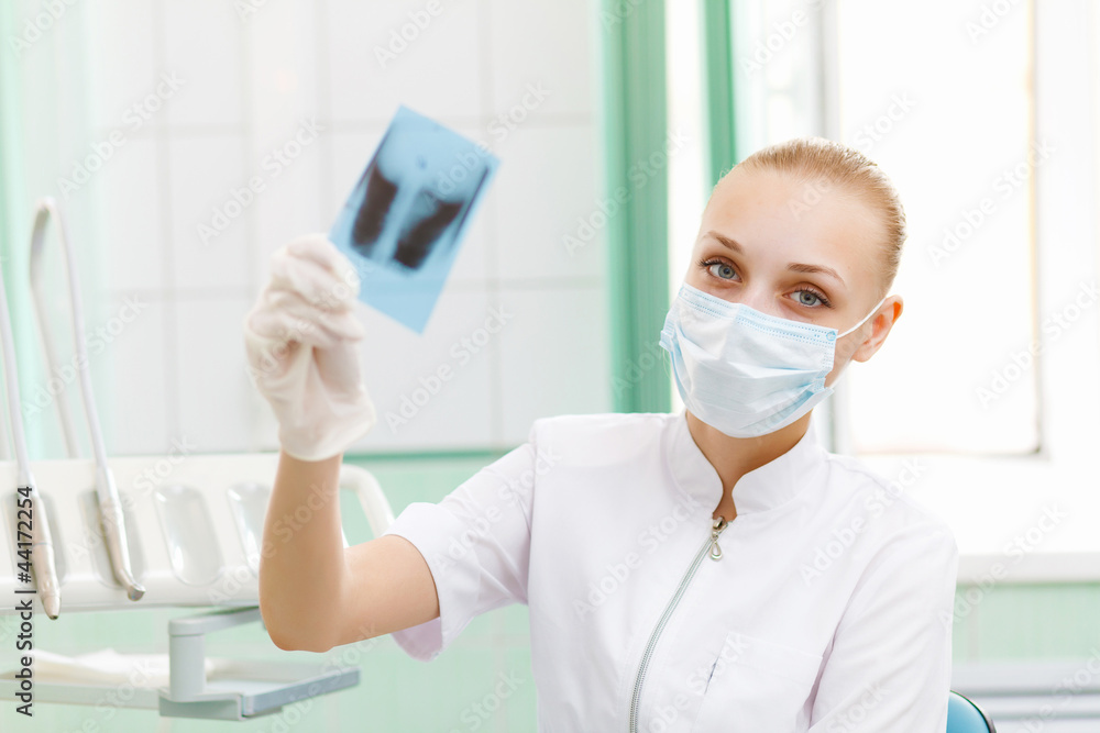 A portrait of a dental worker