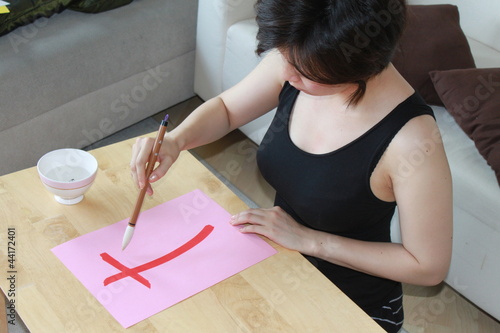 Japanese girl writing hiragana 2