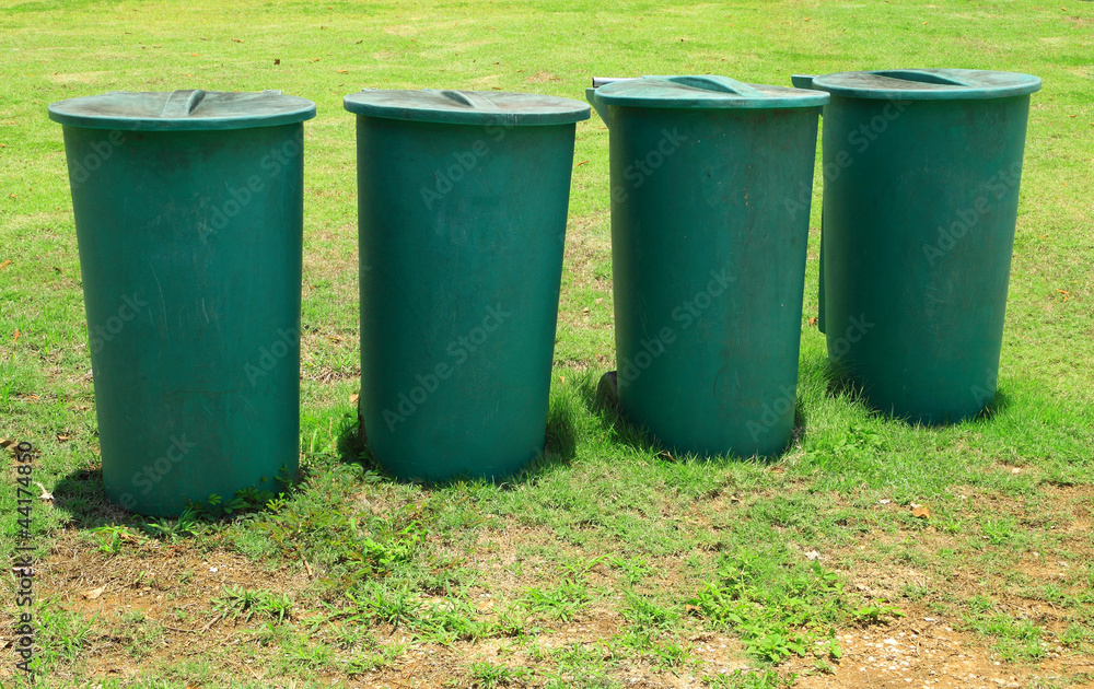 Large green plastic bins