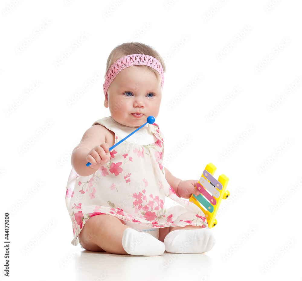 little girl baby playing with musical toy little girl baby playing with musical toy