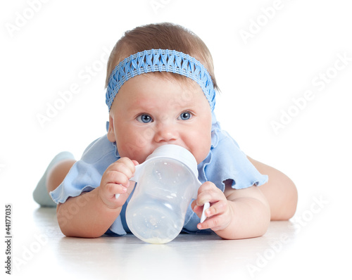 adorable child drinking fro...