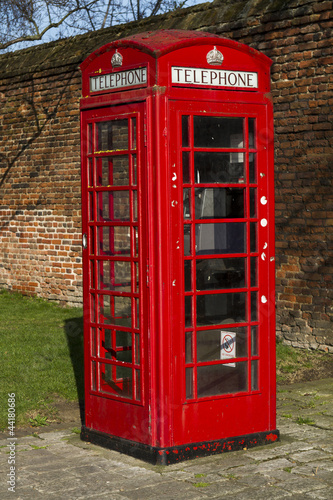 Red telephone booth in Hampton Court