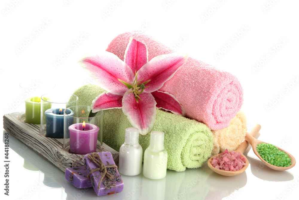 towels with lily, aroma oil, candles, soap and sea salt towels with lily, aroma oil, candles, soap and sea salt