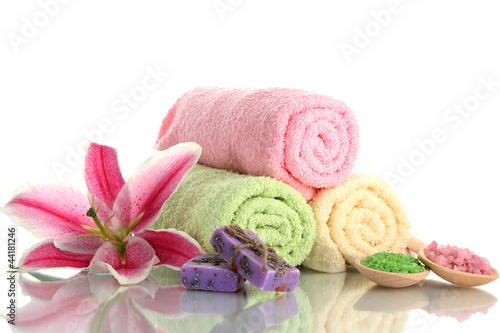 Fototapeta Naklejka Na Ścianę i Meble -  towels with beautiful pink lily, aroma oil and sea salt