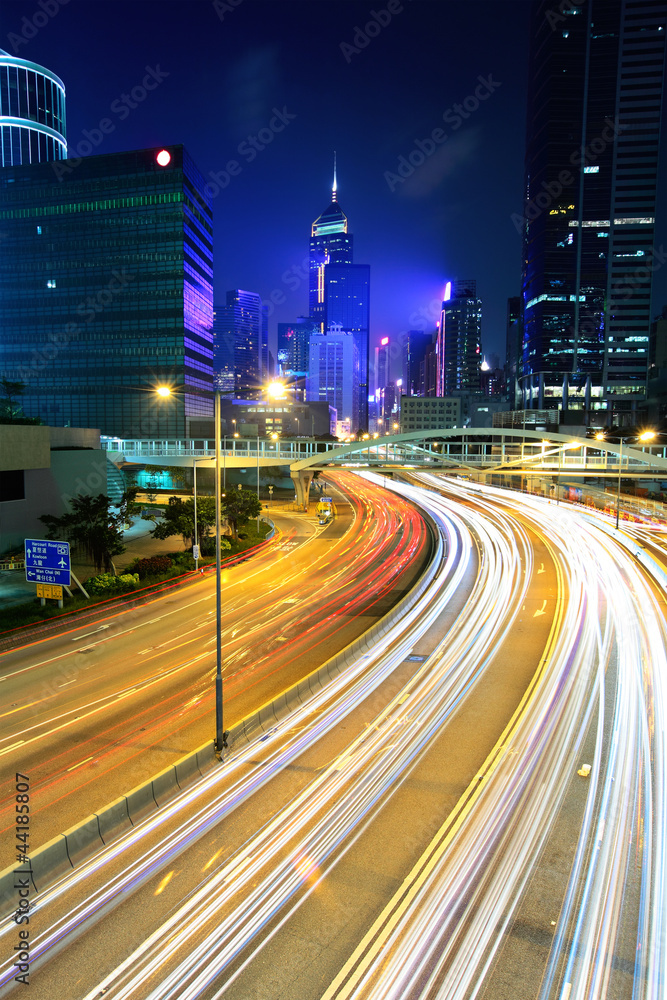 Fototapeta premium city in night with busy traffic