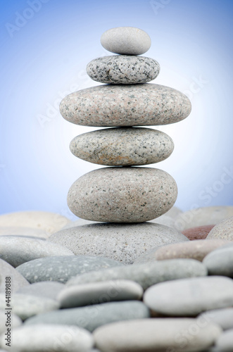 Pebbles stack against gradient background