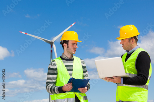 Two Engineers in a Wind Turbine Power Station