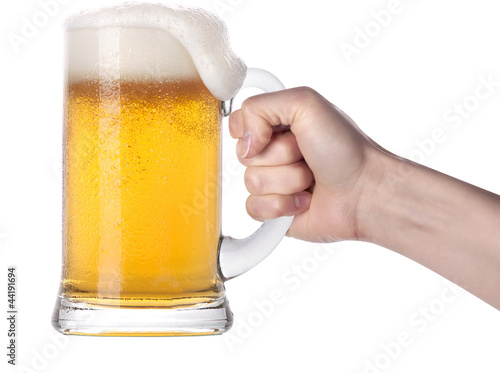 Frosty glass of beer with hand.making toast