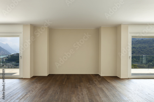 modern interior, wide empty apartment with windows