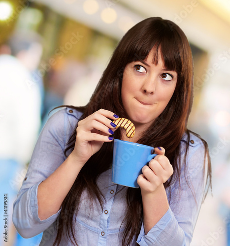 Fotografie Beautiful Woman With Coffee And Cookies