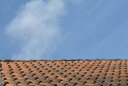 Old clay roof tiles with blue sky  Ribe  Denmark.