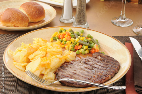 Rib steak and au gratin potatoes