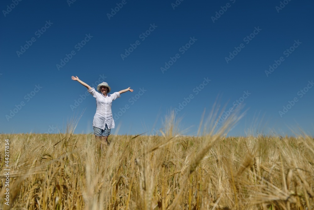 young woman in wheat field at summer young woman in wheat field at summer