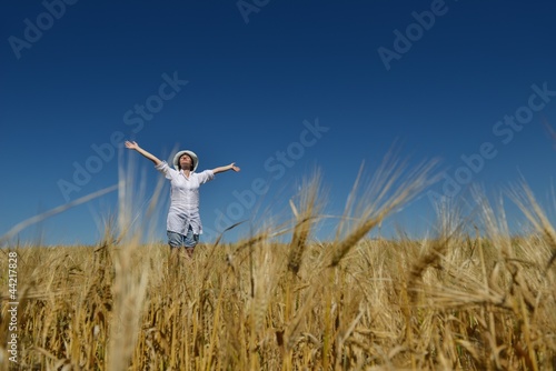 young woman in wheat field at summer © .shock