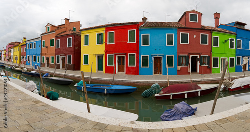 Burano panorama with canal and colourful houses.