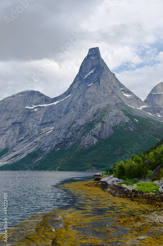 High peak rises from fjord