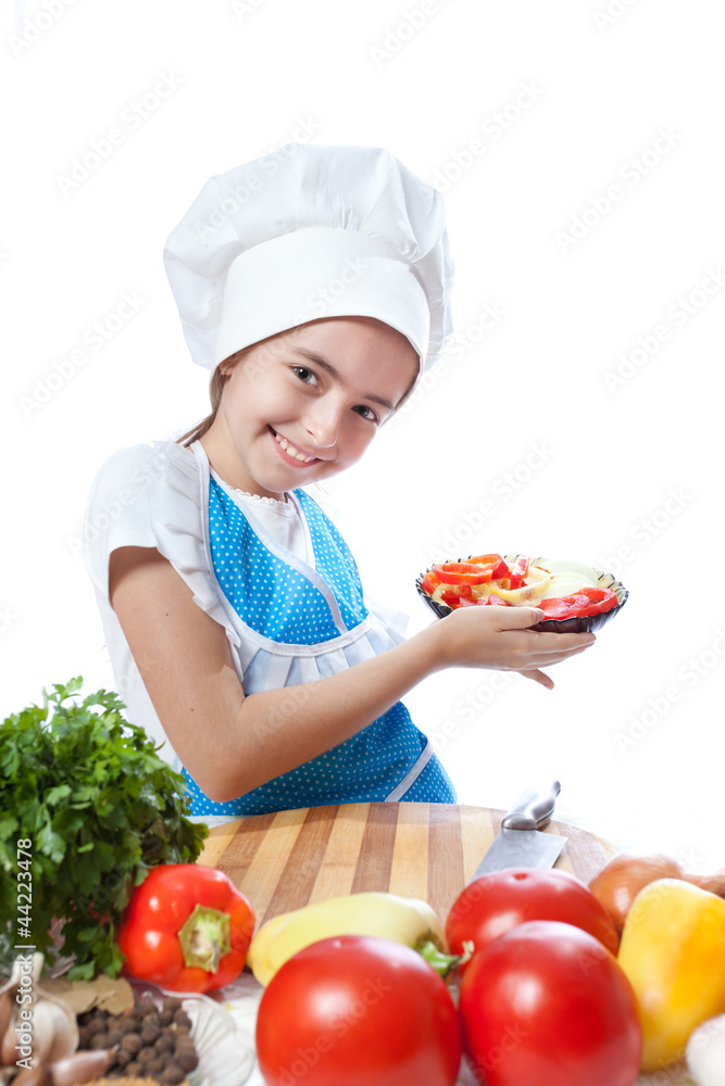 little chef cook with a plate of salad and vegetables little chef cook with a plate of salad and vegetables