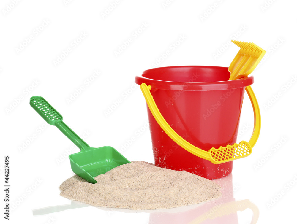 Children's beach toys and sand isolated on white Children's beach toys and sand isolated on white