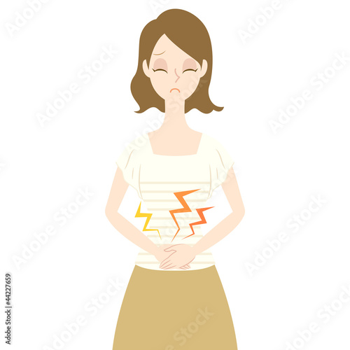 お腹を押さえる女性