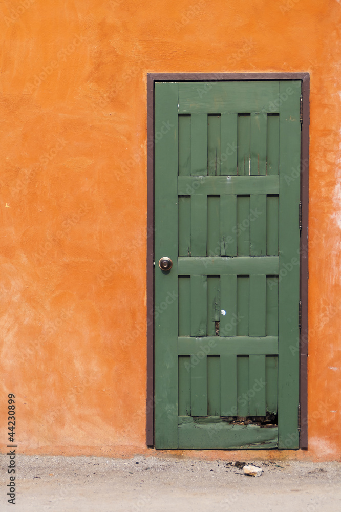 The green door and orange wall