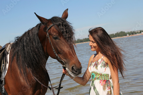 Girl with brown horse