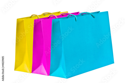Yellow, magenta, cyan shopping bags.