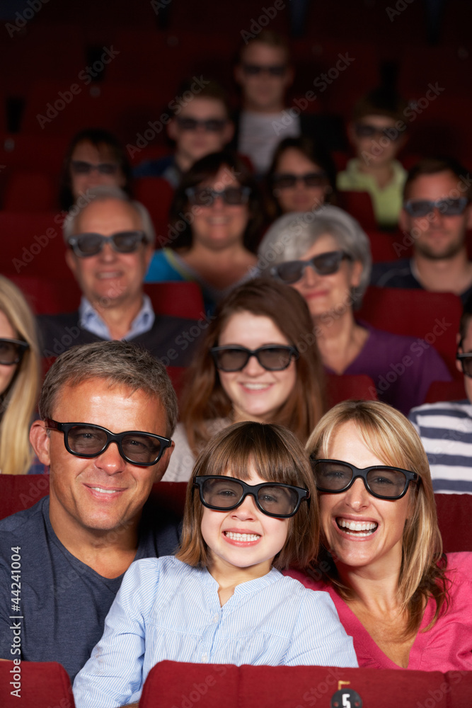 Obraz premium Family Watching 3D Film In Cinema