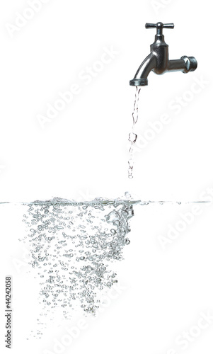 fresh water with faucet and bubbles