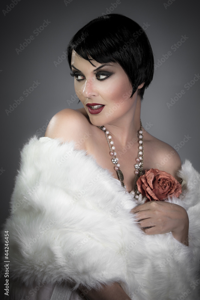 sensuous short haired brunette woman, bare shoulders with white sensuous short haired brunette woman, bare shoulders with white