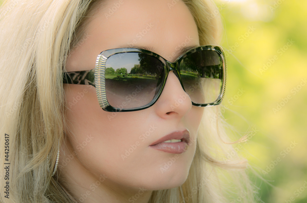 woman in sunglasses woman in sunglasses