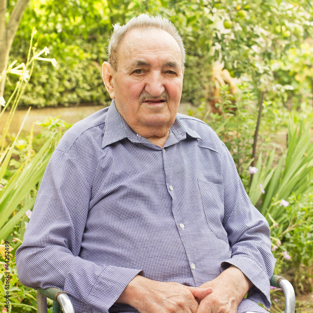 senior man in backyard senior man in backyard