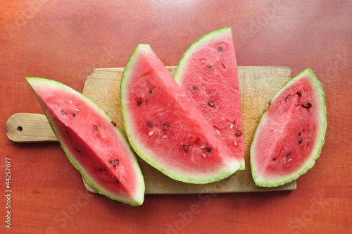 Slices of watermelon on cutting board © agni_irys