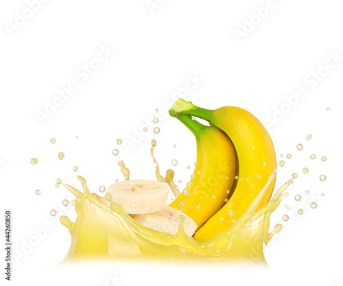 Splash with banana isolated on white