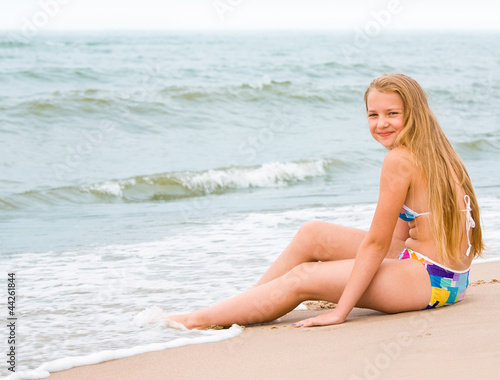 Blond girl on the beach
