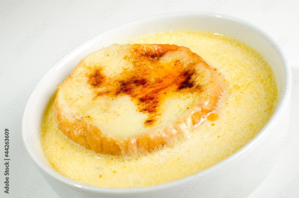 Onion soup on white bowl Onion soup on white bowl