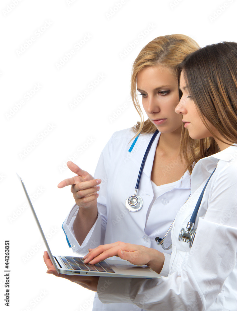 woman doctor and nurse research and hold laptop compute woman doctor and nurse research and hold laptop compute
