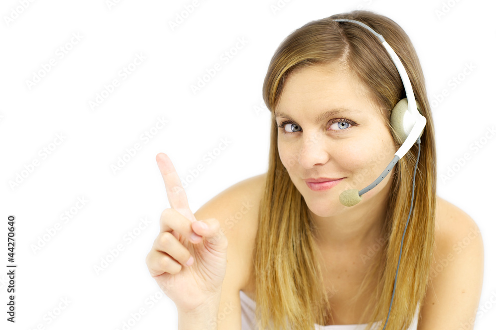 Attractive blond girl with headset shows your text Attractive blond girl with headset shows your text