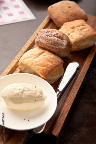 set of fresh breads with butter cream  photo