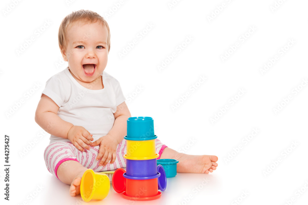 Little girl with a toys, isolated on white Little girl with a toys, isolated on white