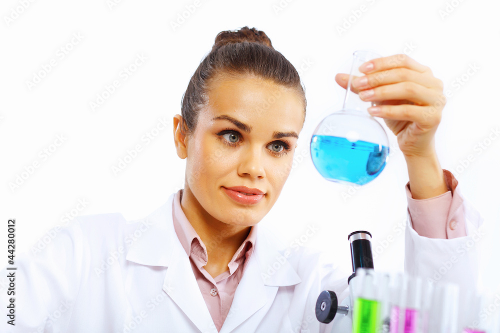 Young female scientist working in laboratory Young female scientist working in laboratory