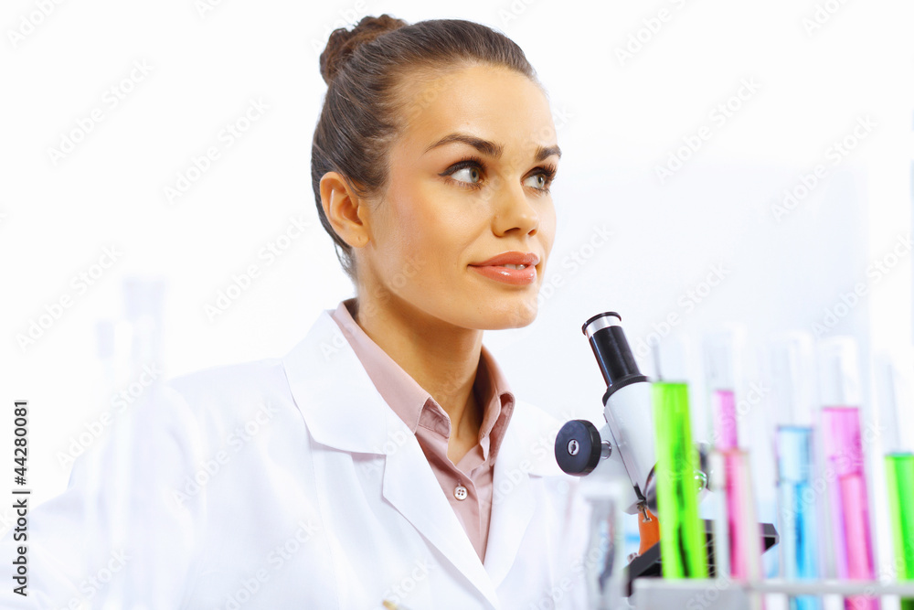 Young female scientist working in laboratory Young female scientist working in laboratory