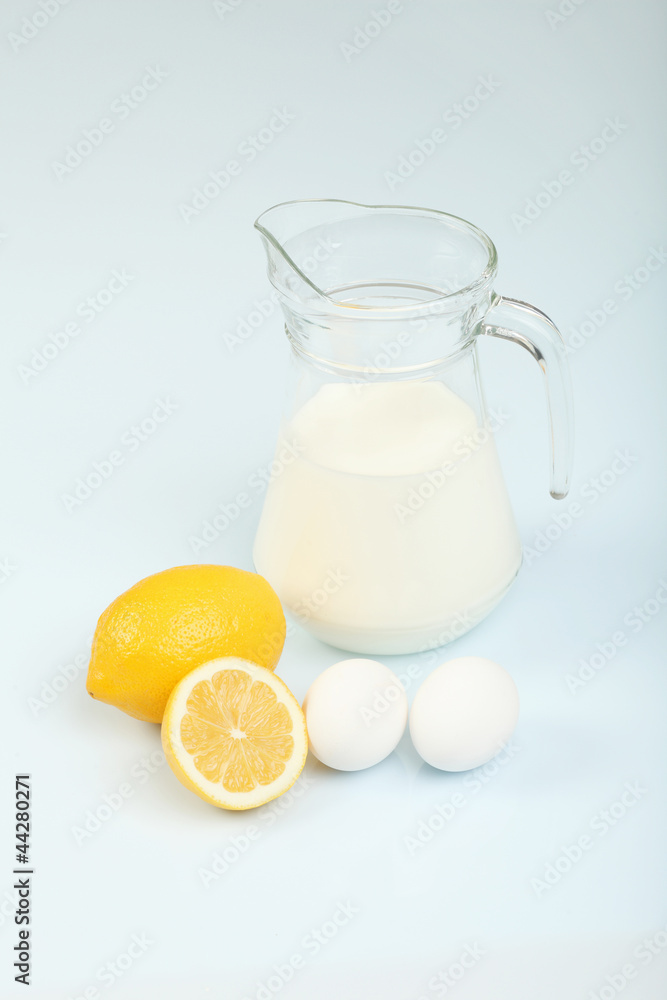 Milk in a glass jar and eggs Milk in a glass jar and eggs