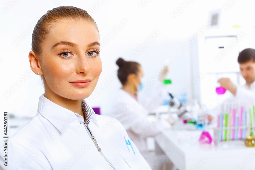 Young female doctor in white uniform Young female doctor in white uniform
