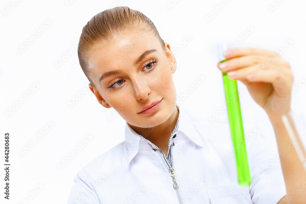 Young female scientist working in laboratory Young female scientist working in laboratory