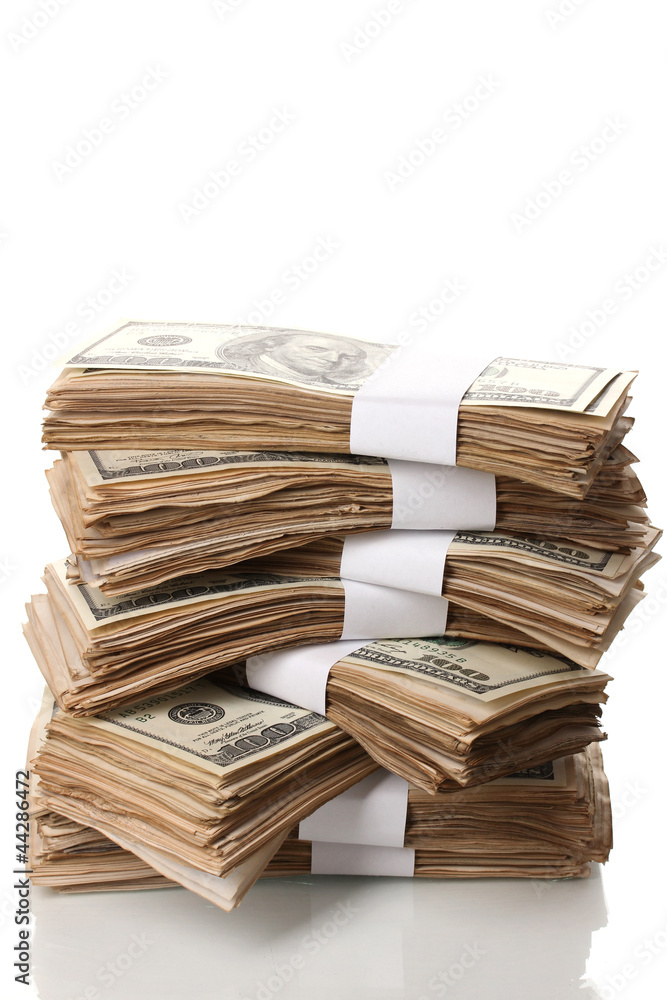 Stack of one hundred dollars banknotes close-up isolated Stack of one hundred dollars banknotes close-up isolated