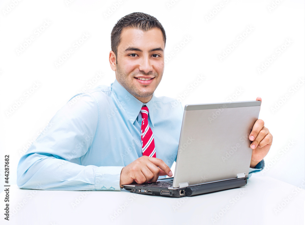 Handsome businessman with laptop. studio shot Handsome businessman with laptop. studio shot