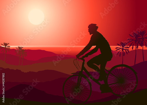 A mountain biker at sunset