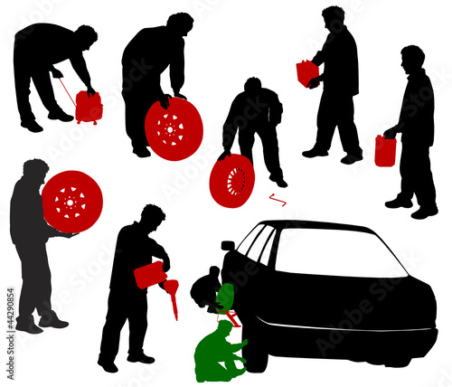 Silhouettes of car mechanics