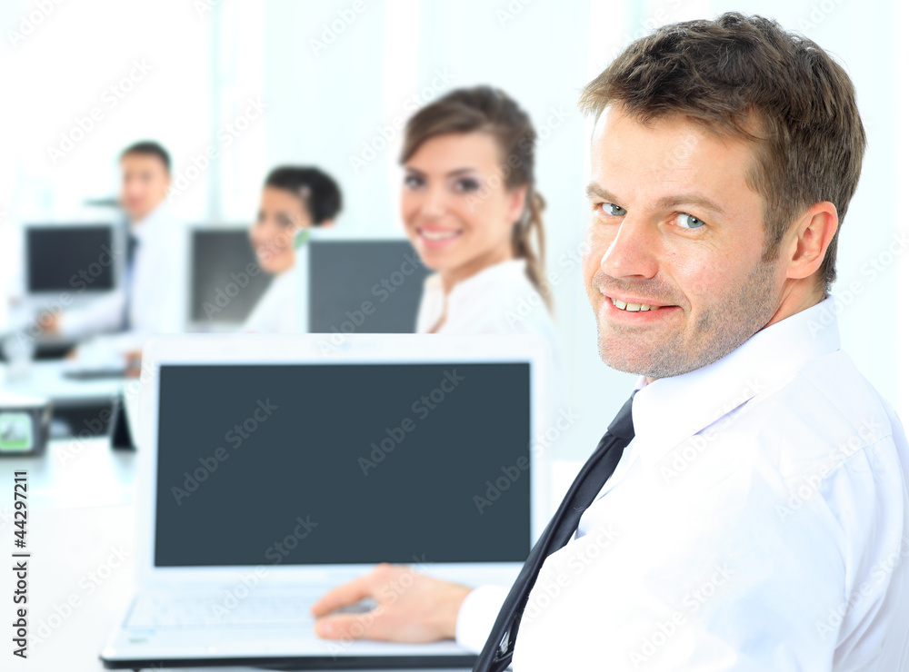 Portrait of a happy man entrepreneur displaying Portrait of a happy man entrepreneur displaying