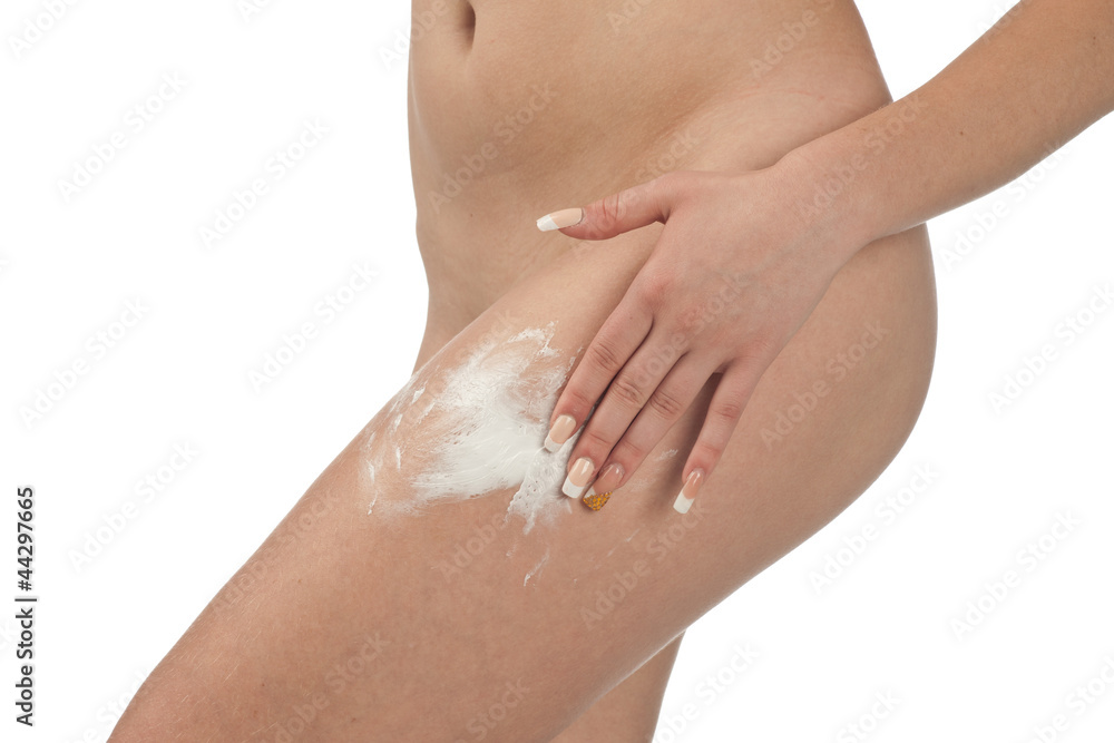 woman applying cream
